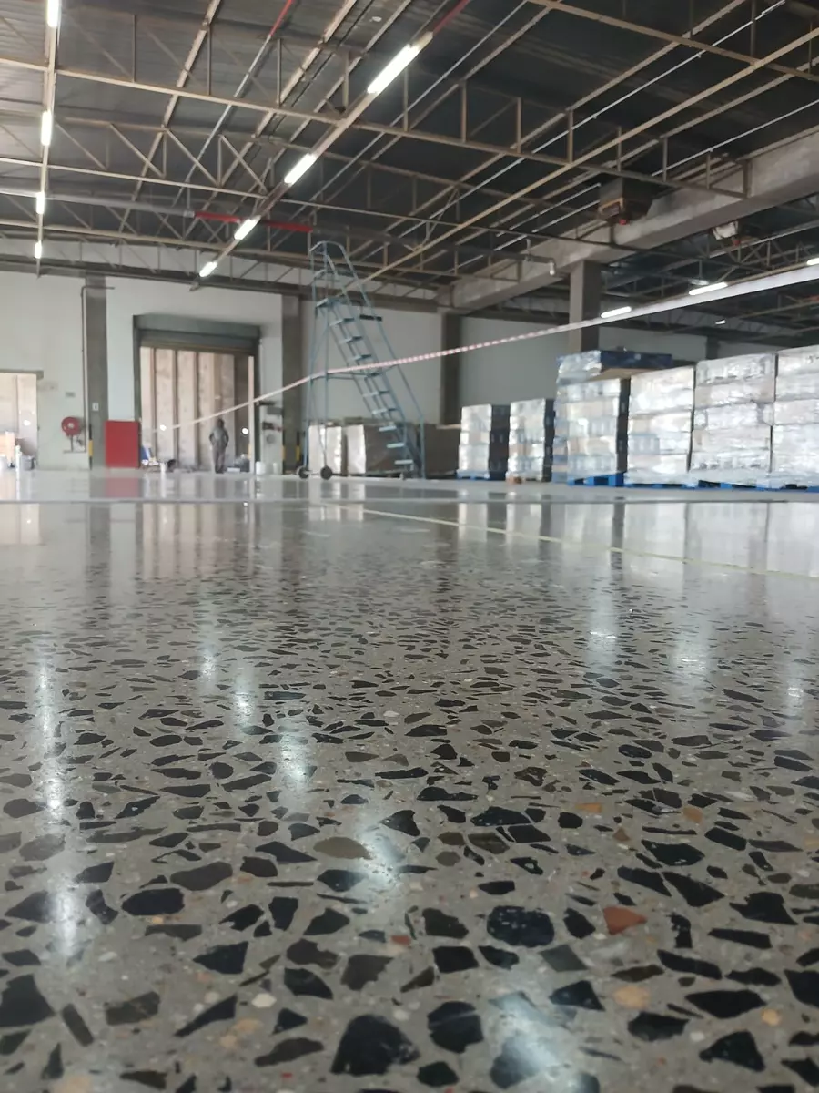 Polished concrete floor in a warehouse interior