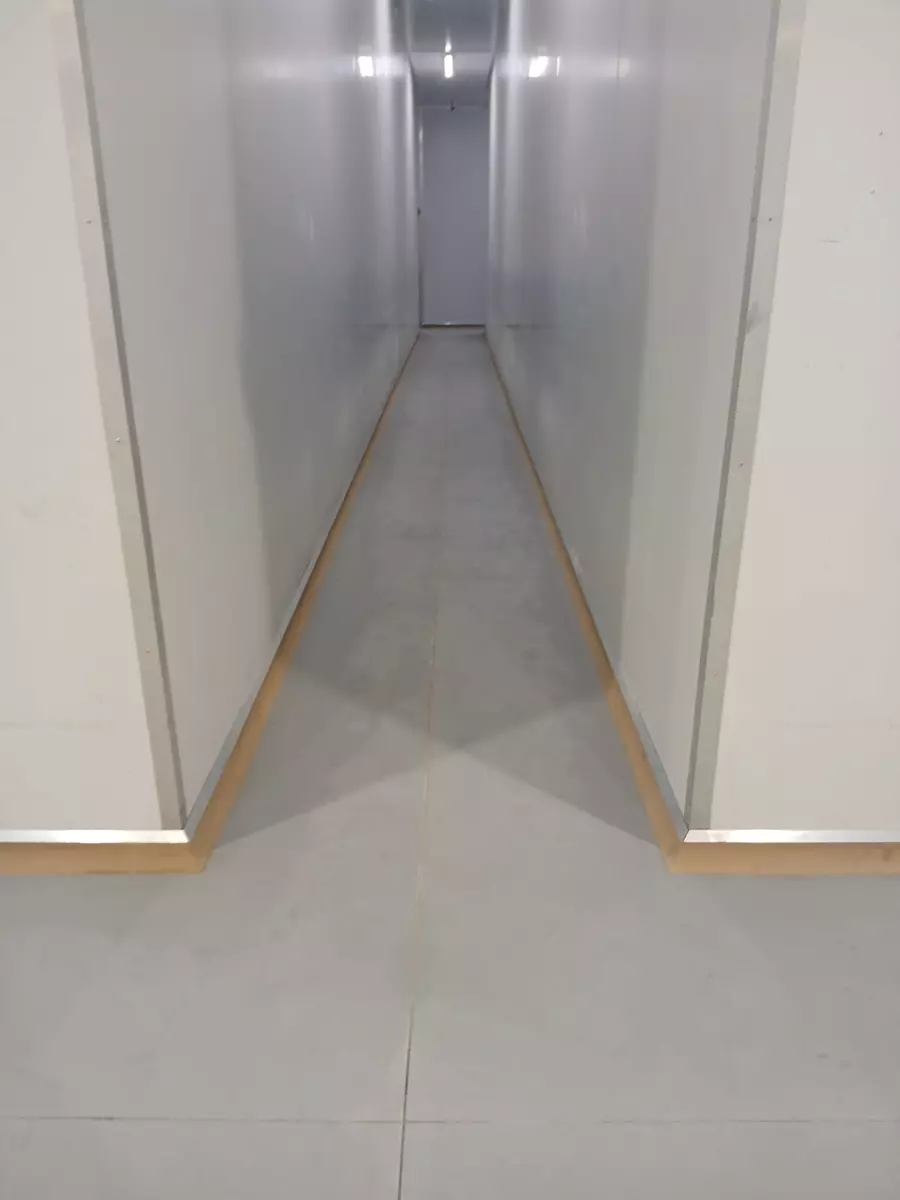 Narrow corridor with polished floor