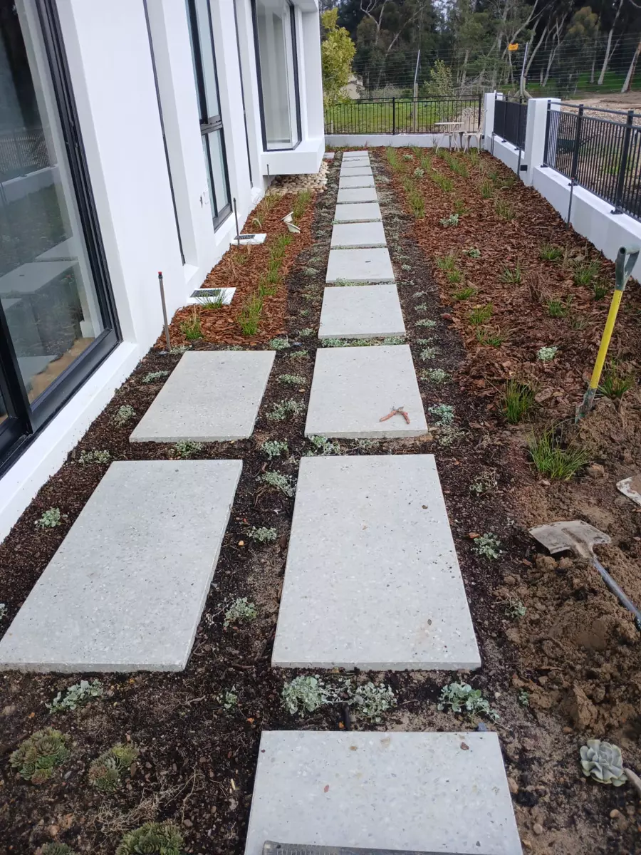Modern house exterior with stepping stone pathway